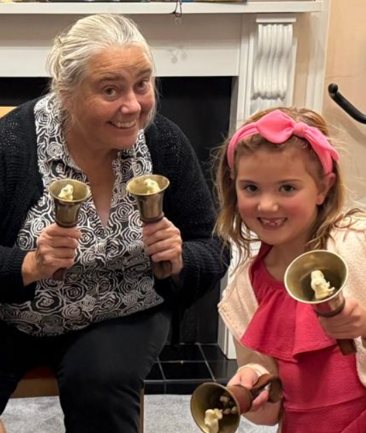 Janice ringing handbells with one of Duncan Loweth’s daughter’s